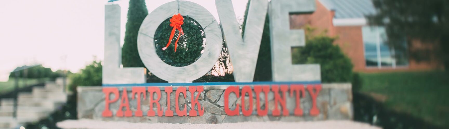 Patrick County LOVE sign with Christmas wreath